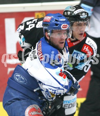 Eishockey Bundesliga. VSV gegen EHC Liwest Linz. Roland Kaspitz (VSV), Raimund Divis (Linz). Villach, am 12.1.2007.
Foto: Kuess 
---
pressefotos, pressefotografie, kuess, qs, qspictures, sport, bild, bilder, bilddatenbank