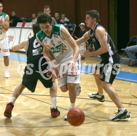 Basketball Bundesliga. W?rthersee Piraten gegen G?ssing Knights. Selmir Husanovic (Piraten), Manuel Jandrasits (G?ssing). Klagenfurt, am 1.11.2006.
Foto: Kuess
---
pressefotos, pressefotografie, kuess, qs, qspictures, sport, bild, bilder, bilddatenbank