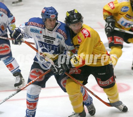 Eishockey Bundesliga. VSV gegen Vienna Capitals. Dany Bosquet (VSV), Manuel Latusa (Capitals). Villach, am 24.9.2006.
---
pressefotos, pressefotografie, kuess, qs, qspictures, sport, bild, bilder, bilddatenbank