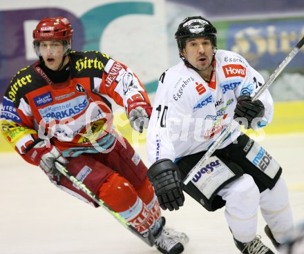 Eishockey Bundesliga. KAC gegen EHC Liwest Black Wings Linz. Christoph Ibounig (KAC), Kent Salfi (Linz). Klagenfurt, am 26.1.2007.
Foto: Kuess
---
pressefotos, pressefotografie, kuess, qs, qspictures, sport, bild, bilder, bilddatenbank