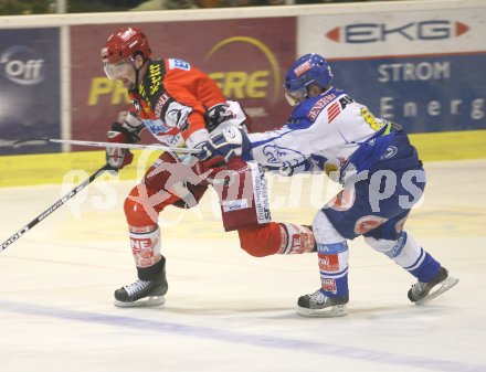 Eishockey Bundesliga. KAC gegen VSV.  Jonathan Aitken (KAC), Roland Kaspitz (VSV). Klagenfurt, am 23.11.2006.
Foto: Kuess
---
pressefotos, pressefotografie, kuess, qs, qspictures, sport, bild, bilder, bilddatenbank