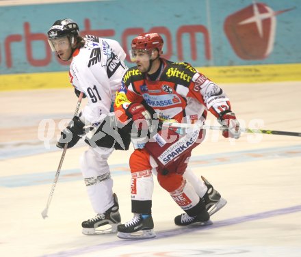 Eishockey Bundesliga. KAC EHC Linz. Viktor Ignatjev (Linz), Jens Kraiger (KAC). Klagenfurt, am 8.10.2006.
---
pressefotos, pressefotografie, kuess, qs, qspictures, sport, bild, bilder, bilddatenbank