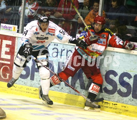 Eishockey Bundesliga. KAC EHC Linz. Raimund Divis (Linz), Riccard Persson (KAC). Klagenfurt, am 8.10.2006.
---
pressefotos, pressefotografie, kuess, qs, qspictures, sport, bild, bilder, bilddatenbank