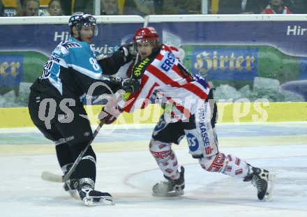 Eishockey Bundesliga. KAC gegen EHC Liwest Linz. Offner (KAC) gegen Privoznik (Linz). Klagenfurt, am 9.12.2005.
---
pressefotos, pressefotografie, kuess, qs, qspictures, sport, bild, bilder, bilddatenbank