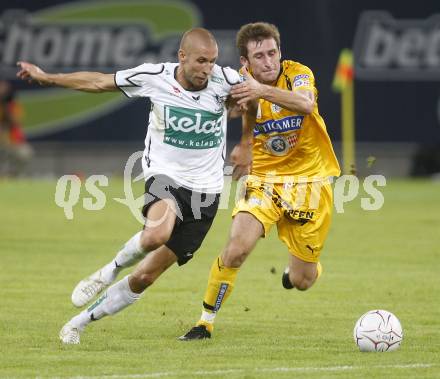 Fussball tipp3 Bundesliga. SK Austria Kaernten gegen SK Sturm Graz. Wolf Patrick (Kaernten), Kandelaki Ilia (Graz). Klagenfurt, 6.8.2008
Copyright Kuess

---
pressefotos, pressefotografie, kuess, qs, qspictures, sport, bild, bilder, bilddatenbank
