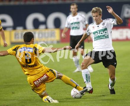Fussball tipp3 Bundesliga. SK Austria Kaernten gegen SK Sturm Graz. Hinum Thomas (Kaernten), Shashiashvili George (Graz). Klagenfurt, 6.8.2008
Copyright Kuess

---
pressefotos, pressefotografie, kuess, qs, qspictures, sport, bild, bilder, bilddatenbank