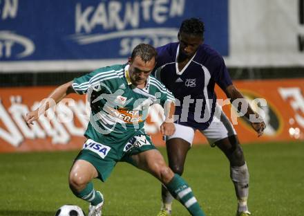 Fussball. OEFB Cup. FC Kaernten gegen SK Rapid Wien. Makanda Christian Mpaka (FCK), Erwin Hoffer (Rapid). Klagenfurt, am 15.8.2008.
Foto: Kuess
---
pressefotos, pressefotografie, kuess, qs, qspictures, sport, bild, bilder, bilddatenbank
