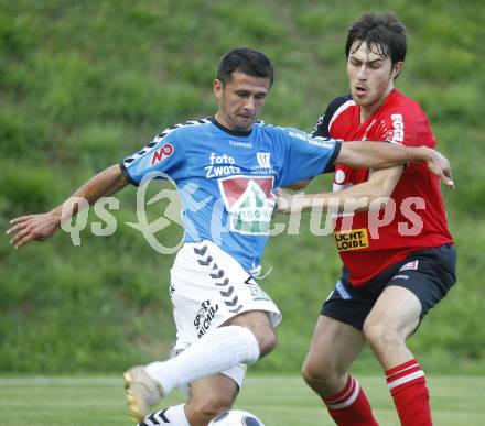 Fussball. Regionalliga. SV Feldkirchen gegen TSV Sparkasse Hartberg. Auron Miloti (Feldkirchen), Roland Kelbert (Hartberg). Feldkirchen, am 22.8.2008.
Foto: Kuess

---
pressefotos, pressefotografie, kuess, qs, qspictures, sport, bild, bilder, bilddatenbank