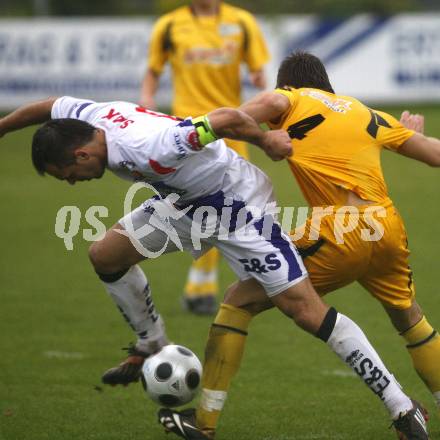 Fussball Regionalliga. SAK gegen SK Sturm Graz Amateure. Goran Jolic (SAK), Joerg Schirgi (Sturm). Klagenfurt, am 22.8.2008.
Foto: Kuess 
---
pressefotos, pressefotografie, kuess, qs, qspictures, sport, bild, bilder, bilddatenbank