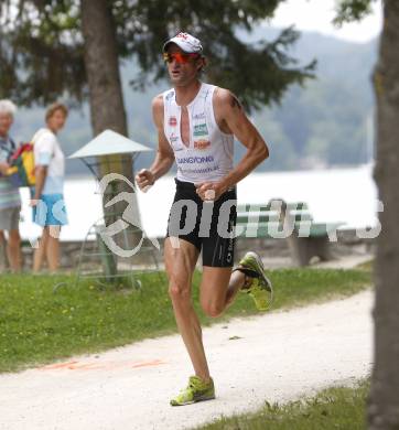 Woerthersee Triathlon. Schwimmen, Radfahren, Laufen. Hannes Hempel. Poertschach, am 31.8.2008.
Foto: Kuess

---
pressefotos, pressefotografie, kuess, qs, qspictures, sport, bild, bilder, bilddatenbank