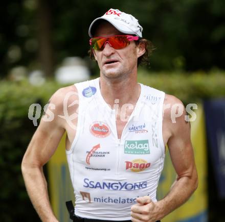 Woerthersee Triathlon. Schwimmen, Radfahren, Laufen. Hannes Hempel. Poertschach, am 31.8.2008.
Foto: Kuess

---
pressefotos, pressefotografie, kuess, qs, qspictures, sport, bild, bilder, bilddatenbank