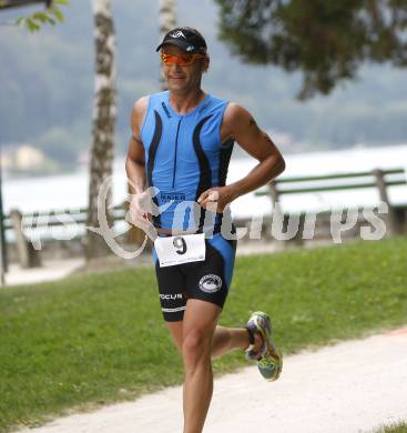 Woerthersee Triathlon. Schwimmen, Radfahren, Laufen. Christian Tammegger. Poertschach, am 31.8.2008.
Foto: Kuess

---
pressefotos, pressefotografie, kuess, qs, qspictures, sport, bild, bilder, bilddatenbank