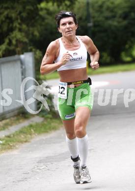 Woerthersee Triathlon. Schwimmen, Radfahren, Laufen. Ulrike Striednig. Poertschach, am 31.8.2008.
Foto: Kuess

---
pressefotos, pressefotografie, kuess, qs, qspictures, sport, bild, bilder, bilddatenbank