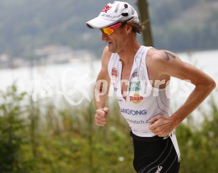 Woerthersee Triathlon. Schwimmen, Radfahren, Laufen. Hannes Hempel. Poertschach, am 31.8.2008.
Foto: Kuess

---
pressefotos, pressefotografie, kuess, qs, qspictures, sport, bild, bilder, bilddatenbank