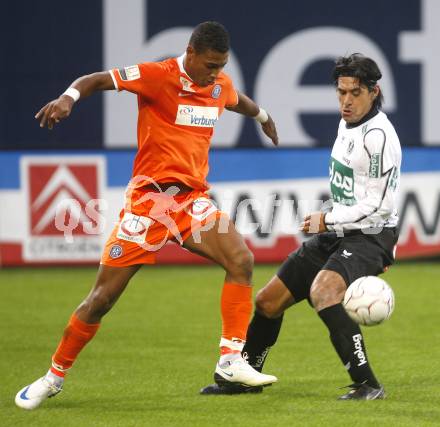 Fussball. Tipp3-Bundesliga. SK Austria Kelag Kaernten  gegen FK Austria Wien. Carlos Chaile (Austria Kaernten), Ruben Okotie (Wien). Klagenfurt, 27.9.2008. 
Copyright Kuess

---
pressefotos, pressefotografie, kuess, qs, qspictures, sport, bild, bilder, bilddatenbank