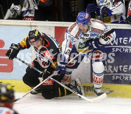 EBEL. Eishockey Bundesliga. EC VSV gegen EV Vienna Capitals. Jonathan Ferland (VSV),  Viktor Ignatjevs (Vienna). Villach, am 17.10.2008.
Foto: Kuess

---
pressefotos, pressefotografie, kuess, qs, qspictures, sport, bild, bilder, bilddatenbank