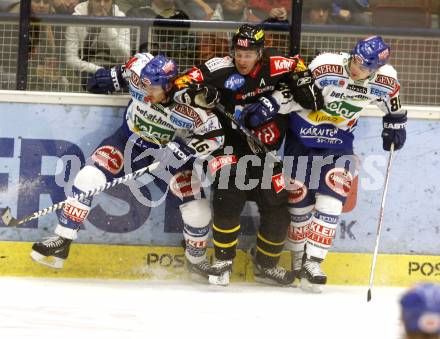 EBEL. Eishockey Bundesliga. EC VSV gegen EV Vienna Capitals. Dan Cavanaugh, Jonathan Ferland (VSV), Viktors Ignatjevs (Vienna). Villach, am 17.10.2008.
Foto: Kuess

---
pressefotos, pressefotografie, kuess, qs, qspictures, sport, bild, bilder, bilddatenbank