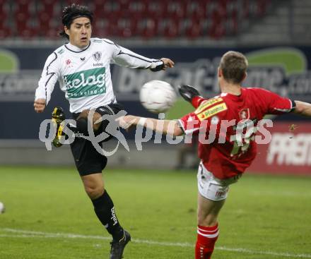 Fussball. Tipp3-Bundesliga. SK Austria Kelag Kaernten  gegen Cashpoint SCR Altach. Carlos Chaile (Austria Kaernten), Mattle Oliver (Altach). Klagenfurt, 12.11.2008. 
Copyright Kuess

---
pressefotos, pressefotografie, kuess, qs, qspictures, sport, bild, bilder, bilddatenbank