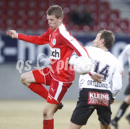 Fussball. Tipp3-Bundesliga. SK Austria Kelag Kaernten  gegen SV Mattersburg. Manuel Ortlechner (Austria Kaernten), Domenik Doleschal (Mattersburg). Klagenfurt, 28.2.2009. 
Foto: Kuess

---
pressefotos, pressefotografie, kuess, qs, qspictures, sport, bild, bilder, bilddatenbank
