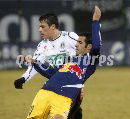 Fussball. Tipp3-Bundesliga. SK Austria Kelag Kaernten  gegen RB Salzburg.  Zlatko Junuzovic, (Austria Kaernten), Anis Boussaidi(Salzburg). Klagenfurt, 4.3..2009. 
Foto: Kuess

---
pressefotos, pressefotografie, kuess, qs, qspictures, sport, bild, bilder, bilddatenbank