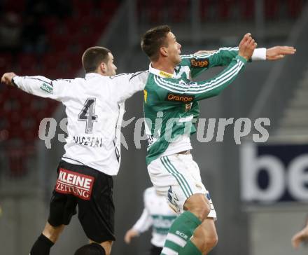 Fussball. Tipp3-Bundesliga. SK Austria Kelag Kaernten gegen SK Rapid. Oliver Pusztai, (Kaernten), Stefan Maierhofer (Rapid). Klagenfurt, 21.3..2009. 
Foto: Kuess

---
pressefotos, pressefotografie, kuess, qs, qspictures, sport, bild, bilder, bilddatenbank