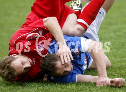 Fussball. Unterliga Ost. Koettmannsdorf gegen Ludmannsdorf. Frank Mario  (Koettmannsdorf), Glantschnig Christian (Ludmannsdorf). Koettmannsdorf, 19.4.2009. 
Foto: Kuess

---
pressefotos, pressefotografie, kuess, qs, qspictures, sport, bild, bilder, bilddatenbank