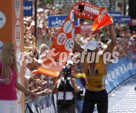Ironman. Triathlon. Schwimmen, Radfahren, Laufen. Ironman Austria. Marino Vanhoenacker (BEL). KLagenfurt, am 5.7.2009.
Foto: Kuess

---
pressefotos, pressefotografie, kuess, qs, qspictures, sport, bild, bilder, bilddatenbank