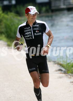 Ironman. Triathlon. Schwimmen, Radfahren, Laufen. Ironman Austria.Norbert Domnik (AUT).  KLagenfurt, am 5.7.2009.
Foto: Kuess

---
pressefotos, pressefotografie, kuess, qs, qspictures, sport, bild, bilder, bilddatenbank
