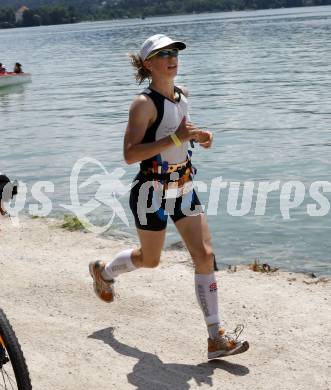 Ironman. Triathlon. Schwimmen, Radfahren, Laufen. Ironman Austria. Sonja Tajsich (GER).  KLagenfurt, am 5.7.2009.
Foto: Kuess

---
pressefotos, pressefotografie, kuess, qs, qspictures, sport, bild, bilder, bilddatenbank