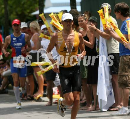 Ironman. Triathlon. Schwimmen, Radfahren, Laufen. Ironman Austria. Marino Vanhoenacker (BEL). KLagenfurt, am 5.7.2009.
Foto: Kuess

---
pressefotos, pressefotografie, kuess, qs, qspictures, sport, bild, bilder, bilddatenbank