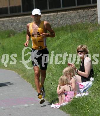 Ironman. Triathlon. Schwimmen, Radfahren, Laufen. Ironman Austria. Marino Vanhoenacker (BEL). KLagenfurt, am 5.7.2009.
Foto: Kuess

---
pressefotos, pressefotografie, kuess, qs, qspictures, sport, bild, bilder, bilddatenbank