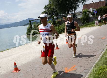 Ironman. Triathlon. Schwimmen, Radfahren, Laufen. Ironman Austria. Norbert Langbrandtner (AUT), Daniel Niederreiter (AUT). KLagenfurt, am 5.7.2009.
Foto: Kuess

---
pressefotos, pressefotografie, kuess, qs, qspictures, sport, bild, bilder, bilddatenbank
