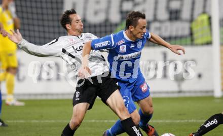 Fussball. Tipp3-Bundesliga. SK Austria Kaernten gegen Magna Wiener Neustadt. Matthias Dollinger, (Austria Kaernten), Hannes Aigner (Wiener Neustadt). Klagenfurt, 17.10.2009. 
Foto: Kuess

---
pressefotos, pressefotografie, kuess, qs, qspictures, sport, bild, bilder, bilddatenbank