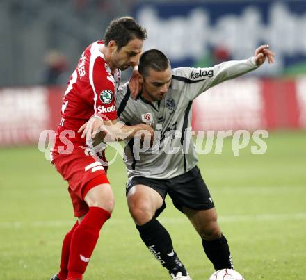 Fussball. Tipp3-Bundesliga. SK Austria Kelag Kaernten gegen SV Superfund Kapfenberg. Andre Schembri,  (Austria Kaernten) Andreas Rauscher (Kapfenberg). Klagenfurt, 24.10.2009.
Foto: Kuess  

---
pressefotos, pressefotografie, kuess, qs, qspictures, sport, bild, bilder, bilddatenbank