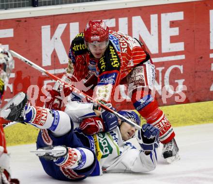EBEL. Eishockey Bundesliga.  VSV gegen KAC. Jonathan Ferland, (VSV), David Schuller (KAC). Villach, am 8.12.2009.
Foto: Kuess 


---
pressefotos, pressefotografie, kuess, qs, qspictures, sport, bild, bilder, bilddatenbank