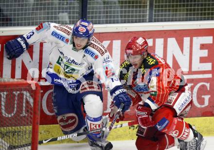EBEL. Eishockey Bundesliga.  VSV gegen KAC. Benjamin Petrik, (VSV), Johannes Kirisits (KAC). Villach, am 8.12.2009.
Foto: Kuess 


---
pressefotos, pressefotografie, kuess, qs, qspictures, sport, bild, bilder, bilddatenbank