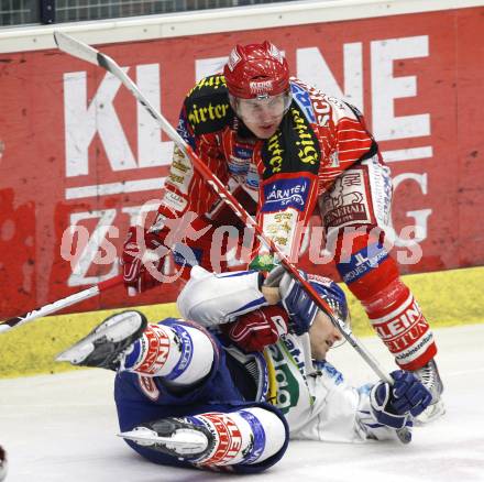 EBEL. Eishockey Bundesliga.  VSV gegen KAC. Jonathan Ferland (VSV), David Schuller (KAC). Villach, am 8.12.2009.
Foto: Kuess 


---
pressefotos, pressefotografie, kuess, qs, qspictures, sport, bild, bilder, bilddatenbank