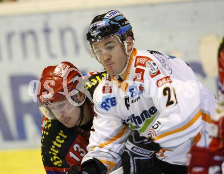 EBEL. Eishockey Bundesliga. KAC gegen EHC LIWEST Linz. Johannes Kirisits, (KAC),  Brad Purdie (Linz). Klagenfurt, am 20.12.2009.
Foto: Kuess 

---
pressefotos, pressefotografie, kuess, qs, qspictures, sport, bild, bilder, bilddatenbank