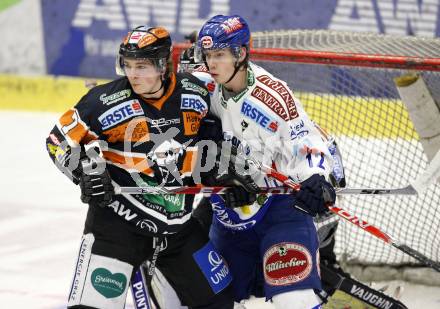 EBEL. Eishockey Bundesliga. EC Pasut VSV gegen Graz 99ers. Michael Raffl,  (VSV), Victor Lindgren (Graz). Villach, am 15.1.2010.
Foto: Kuess 


---
pressefotos, pressefotografie, kuess, qs, qspictures, sport, bild, bilder, bilddatenbank