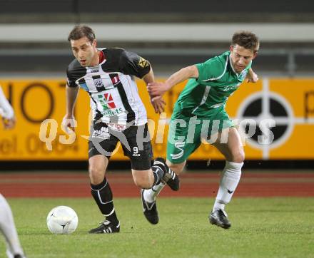 Fussball Regionalliga. SK St. Andrae/Lavanttal gegen FC Superfund Pasching. Marco Reich (St. Andrae/Lavanttal), Bozo Kovacevic(Pasching). Wolfsberg, 26.3.2010.
Foto: Kuess
---
pressefotos, pressefotografie, kuess, qs, qspictures, sport, bild, bilder, bilddatenbank