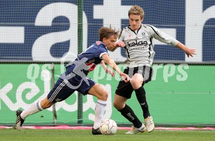 Fussball. Bundesliga. SK Austria Kelag Kaernten  gegen Red Bull Salzburg. Michael Sollbauer, (Austria Kaernten), Dusan Svento (Salzburg). Klagenfurt, 10.4.2010. 
Foto: Kuess

---
pressefotos, pressefotografie, kuess, qs, qspictures, sport, bild, bilder, bilddatenbank