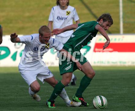Fussball Regionalliga. FC St. Veit gegen FC Superfund Pasching. Raphael Groinig (St. Veit), Marc Sand (Pasching). St. Veit, am 28.5.2010.
Foto: Kuess
---
pressefotos, pressefotografie, kuess, qs, qspictures, sport, bild, bilder, bilddatenbank