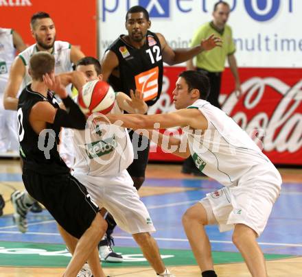 Basketball Bundesliga. Woerthersee Piraten gegen UBC Guessing Knights.  Eric Rhinehart, (Piraten),  Thomas Klepeisz (Guessing Knights). Klagenfurt, 2.10.2010.
Foto:  Kuess

---
pressefotos, pressefotografie, kuess, qs, qspictures, sport, bild, bilder, bilddatenbank