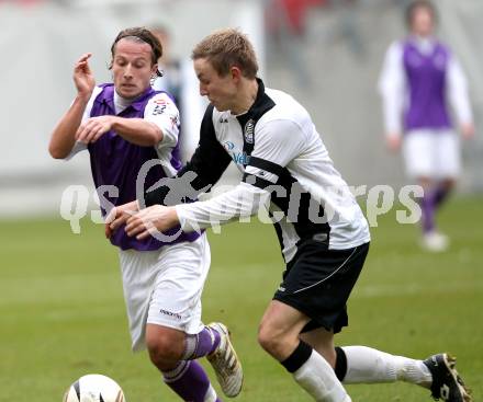 Fussball. Regionalliga. SK Austria Klagenfurt gegen Sturm Graz Amateure. Michael Kulnik (Klagenfurt), Wurzinger Florian (Graz). Klagenfurt, 7.11.2010. 
Foto: Kuess

---
pressefotos, pressefotografie, kuess, qs, qspictures, sport, bild, bilder, bilddatenbank