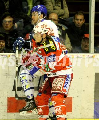 EBEL. Eishockey Bundesliga. EC KAC gegen KHL Medvescak Zagreb. Manuel Geier (KAC), POWERS Christopher (Zagreb). Klagenfurt, am 3.3.2011.
Foto: Kuess 

---
pressefotos, pressefotografie, kuess, qs, qspictures, sport, bild, bilder, bilddatenbank