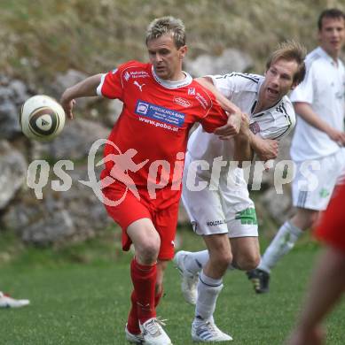 Fussball Unterliga Ost. DSG Sele Zell gegen SV Ludmannsdorf. Samir Cavkunovic (Sele Zell), Christian Glantschnig (Ludmannsdorf). Zell Pfarre, am 23.4.2011.
Foto: Kuess
---
pressefotos, pressefotografie, kuess, qs, qspictures, sport, bild, bilder, bilddatenbank