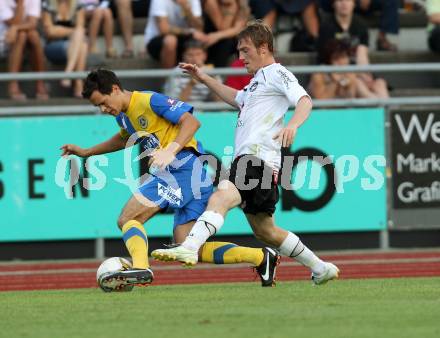 Fussball Bundesliga. Erste Liga. WAC/St. Andrae gegen Vienna. Mathias Berchtold, (WAC/St.Andrae), Marcel Toth (Vienna). Wolfsberg, 19.8.2011
Foto: Kuess

---
pressefotos, pressefotografie, kuess, qs, qspictures, sport, bild, bilder, bilddatenbank