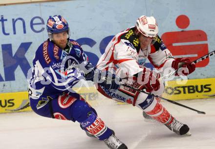 EBEL. Eishockey Bundesliga. EC Rekord Fenster VSV gegen EC KAC. Derek Damon,   (VSV), Tyler Spurgeon (KAC). Villach, am 18.9.2011.
Foto: Kuess 


---
pressefotos, pressefotografie, kuess, qs, qspictures, sport, bild, bilder, bilddatenbank