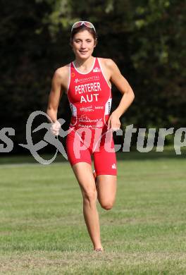 Triathlon. Laufen, Schwimmen, Radfahren. Lisa Perterer. 
Klagenfurt, 22.9.2011.
Foto: Kuess
---
pressefotos, pressefotografie, kuess, qs, qspictures, sport, bild, bilder, bilddatenbank