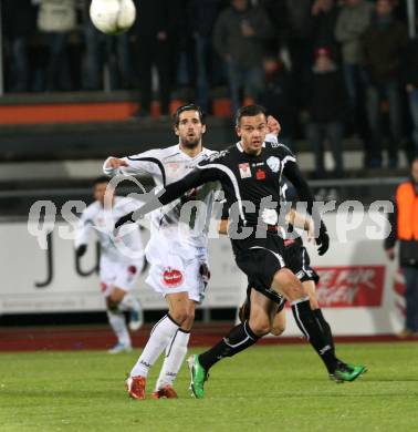Fussball. Erste Liga. RZ Pellets WAC/St. Andrae gegen TSV Sparkasse Hartberg. Jacobo (WAC), Huber Michael (Hartberg). Wolfsberg, 21.10.2011. 
Foto: Kuess

---
pressefotos, pressefotografie, kuess, qs, qspictures, sport, bild, bilder, bilddatenbank